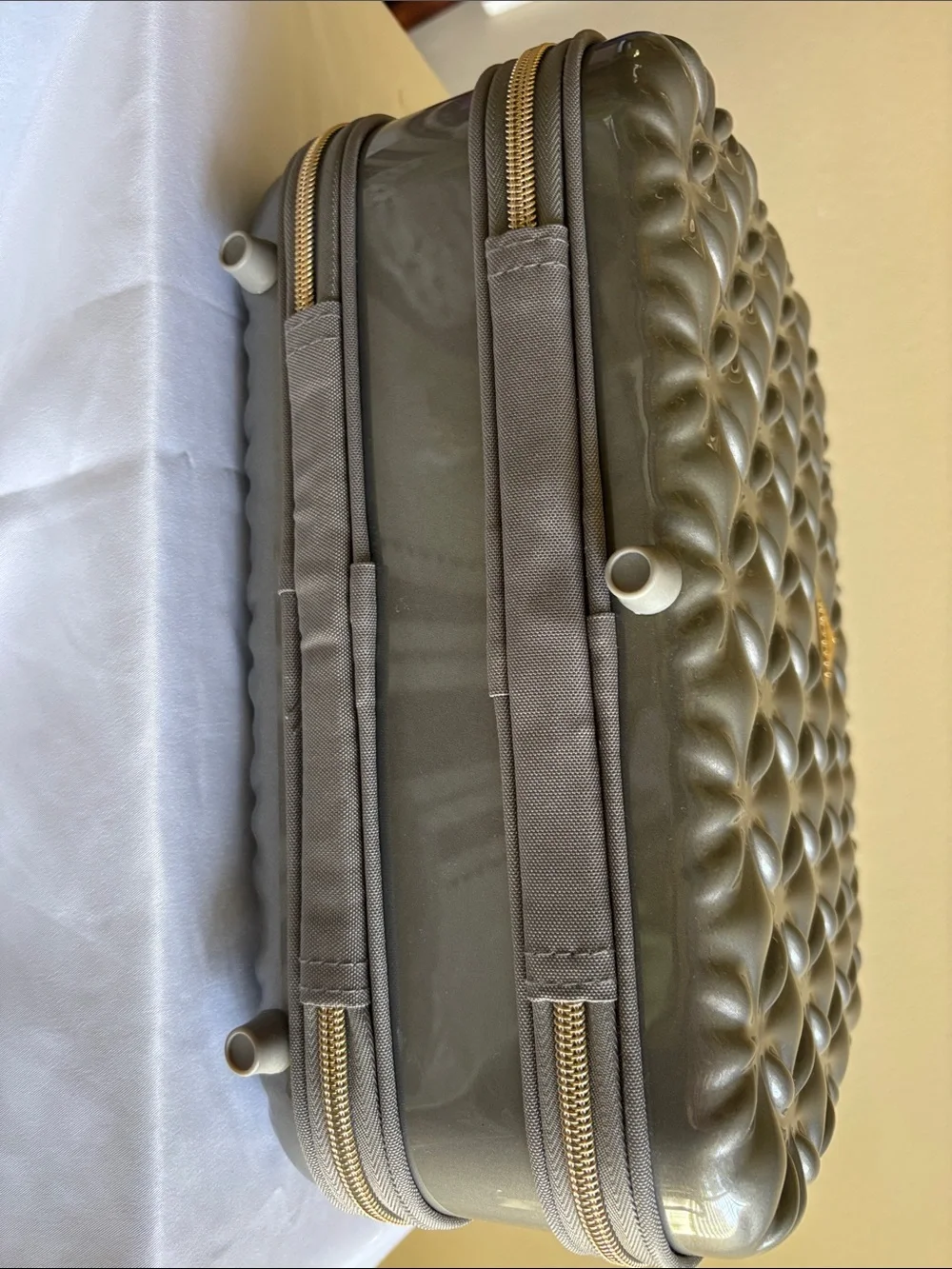 Metallic Gray Quilted Cosmetic Case with Gold Accents